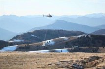 Folgaria (TN) - Neve portata in elicottero sulle piste da sci.